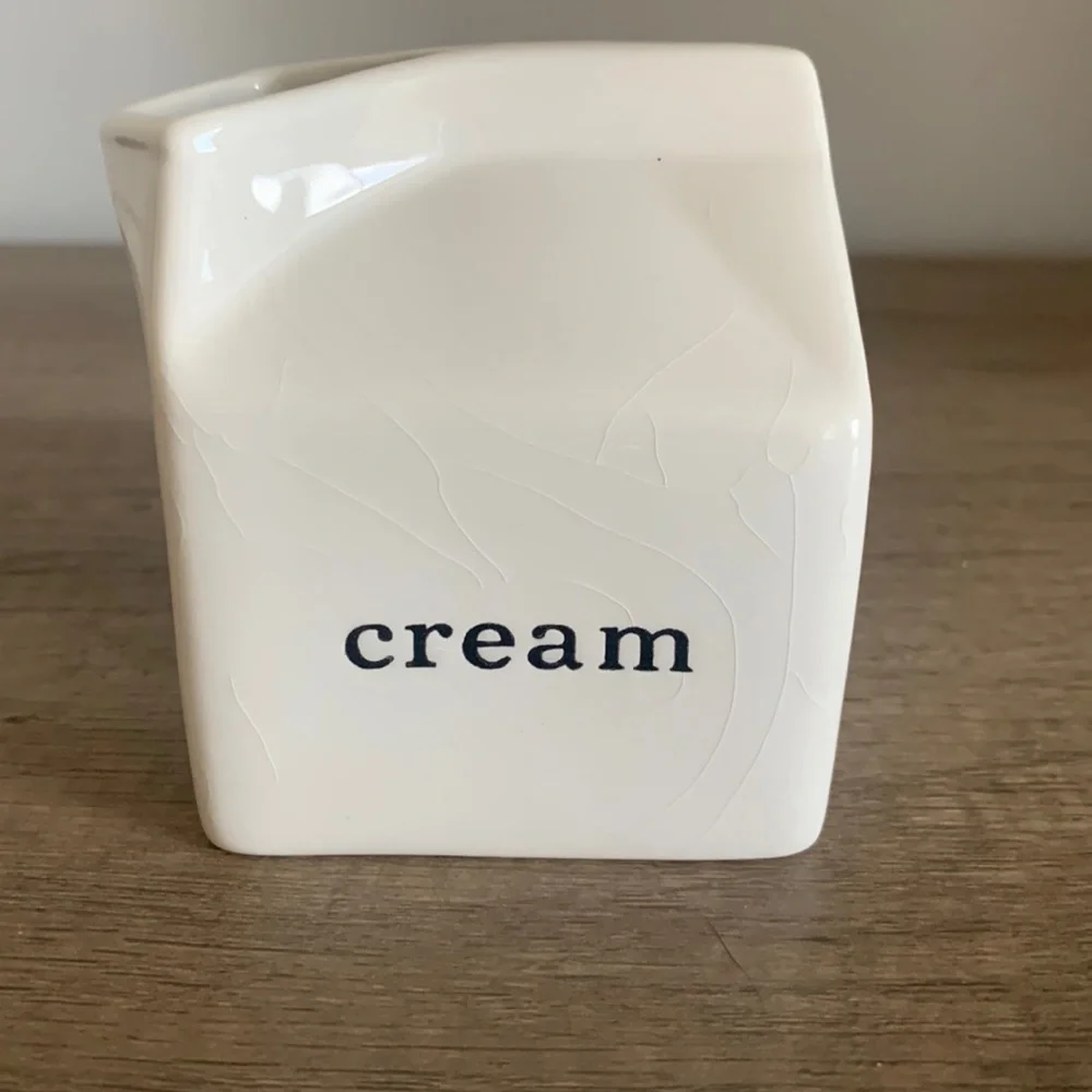 Crate & Barrel cream container/server